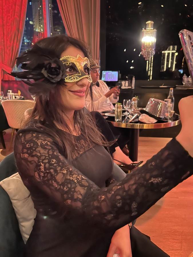 masquerade, gold and feathers